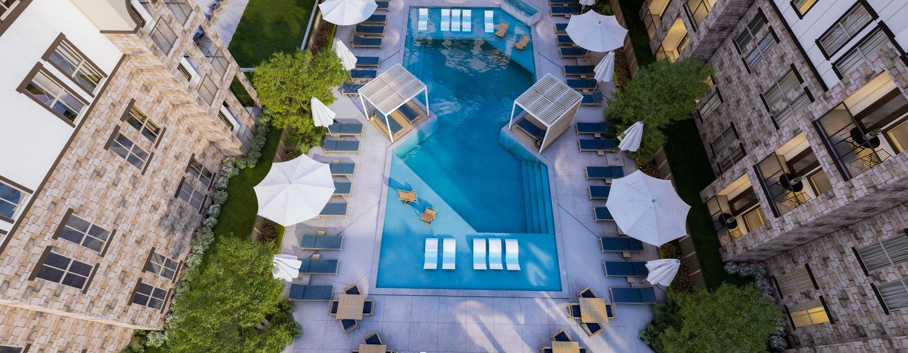 a pool surrounded by buildings